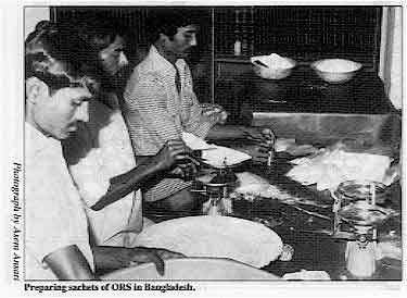 Preparing sachets of ORS in Bangladesh.