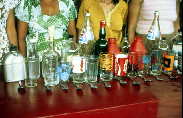 Slide 29 - This assortment of different-sized glasses and spoons displayed on a counter in Honduras explains the reasons for the wide variation found.