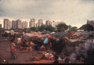Slums/High rise Buildings- slide 17 - A Kind of Living